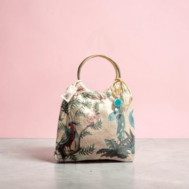 Colección Pelícano Bolos tela con motivos florales con aro metalico
